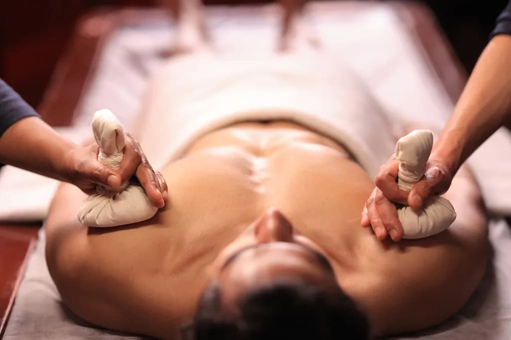A serene spa setting in Warsaw with soft lighting, warm tones, and a relaxing massage atmosphere focused on wellness and sensory relaxation.