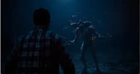 Demogorgon confronting a person in a dark forest scene from Stranger Things.