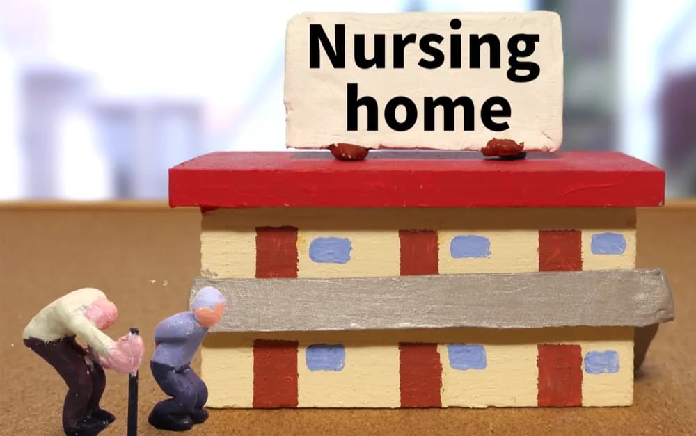Caregiver supporting a dementia patient, highlighting awareness of silent signs of abuse and elder safety concerns.